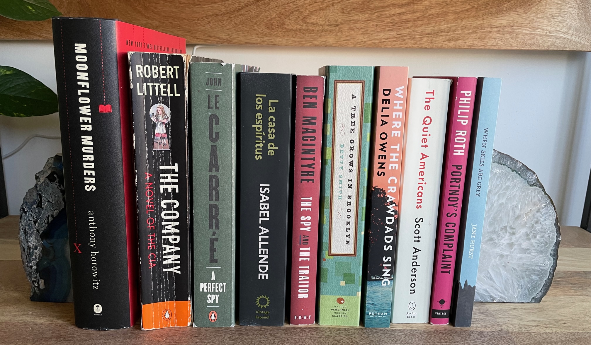 Books and art on a styled shelf